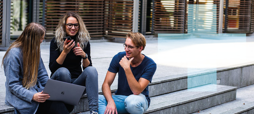 3 students sitting on steps outside chatting 3 students sitting on steps outside chatting