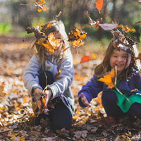 Children playing with leaves