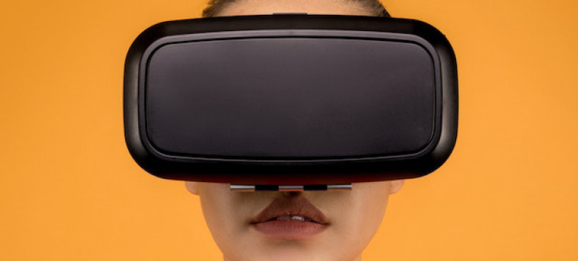 Close up of female student with a VR headset